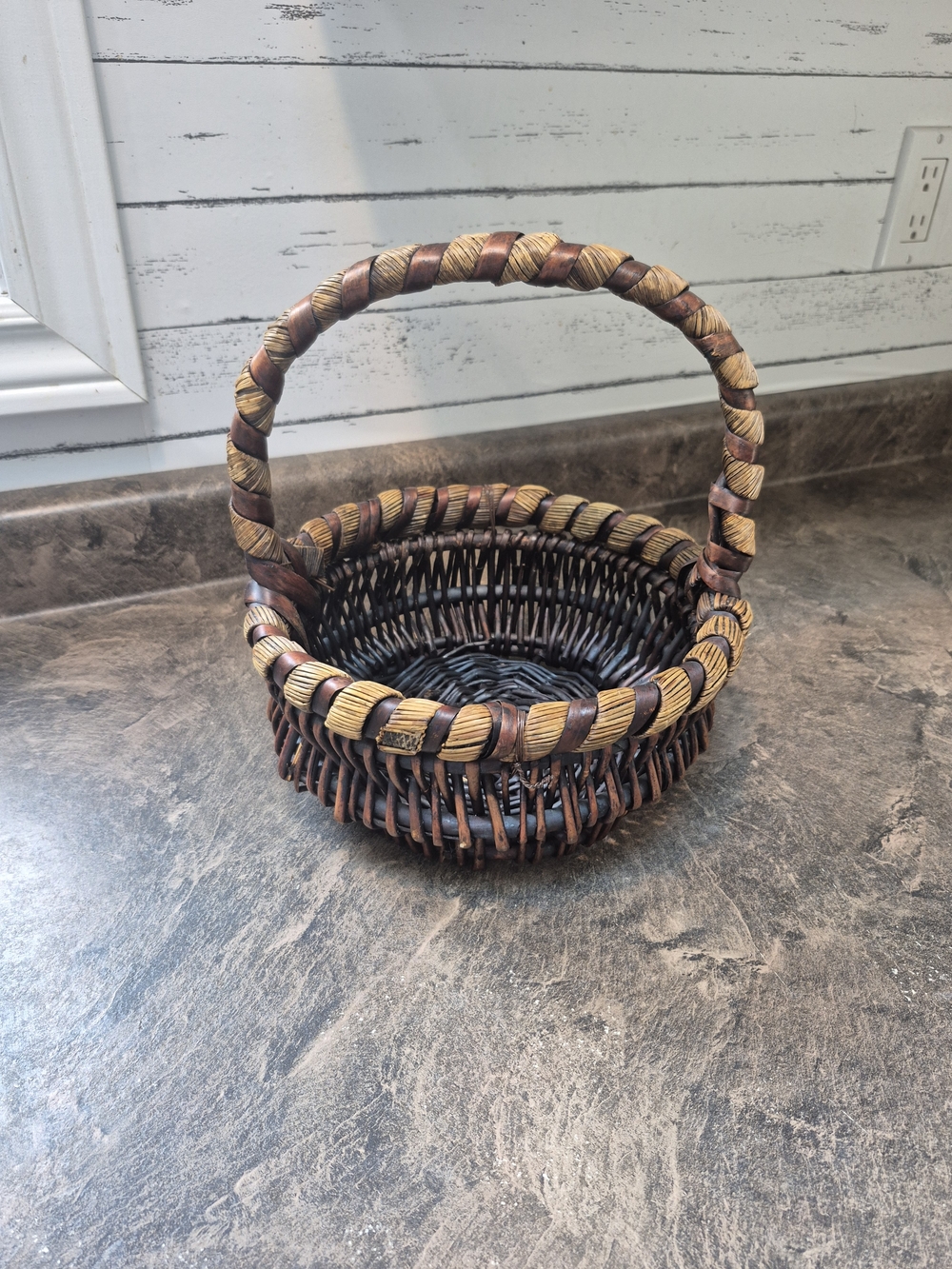 Handwoven Brown and Tan Wicker Basket with Handle